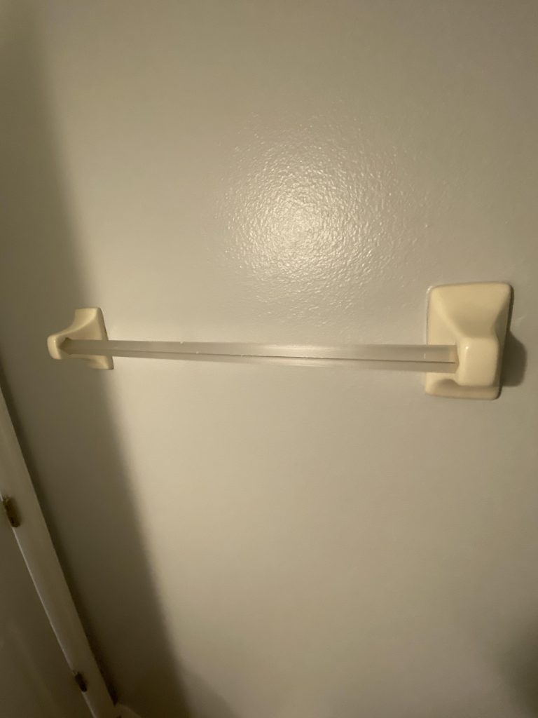 how to remove towel bar